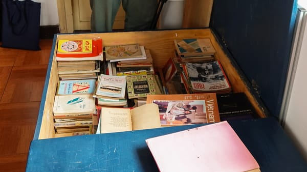 Images of old books in the blue square box